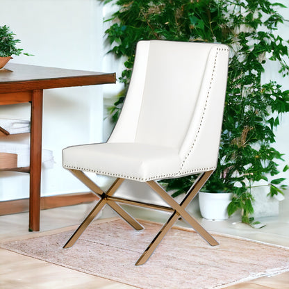 Chaise de salle à manger rembourrée en similicuir blanc et doré