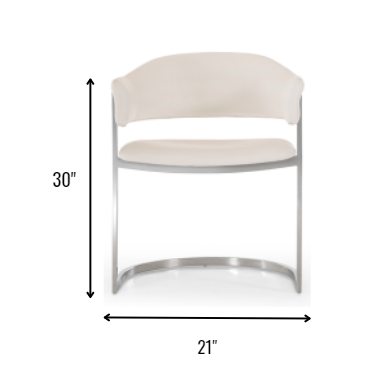 Chaise de salle à manger à dossier ailé en similicuir blanc et argent