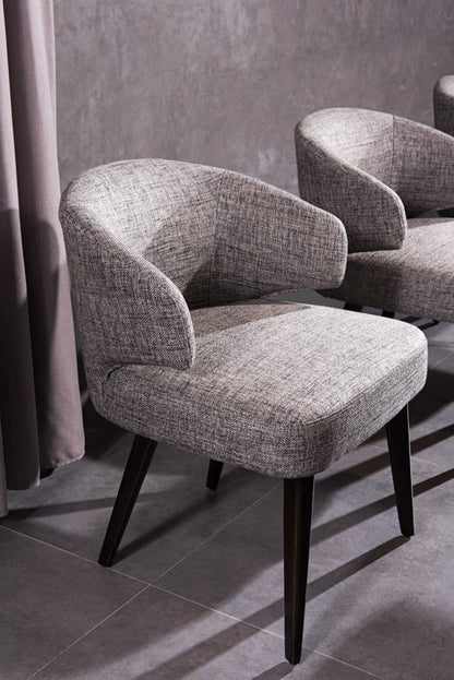 Chaise de salle à manger à dossier à oreilles en tissu rembourré gris et noir