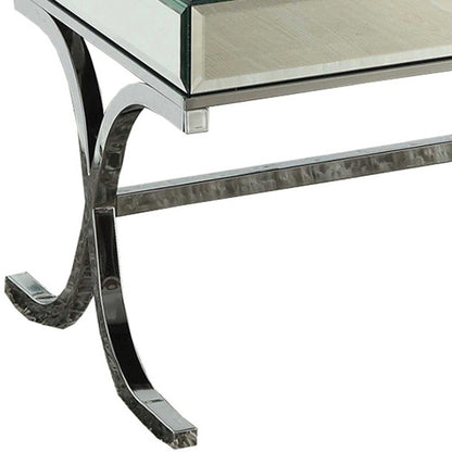 Table basse avec plateau en miroir et chrome 42" x 21" x 19"