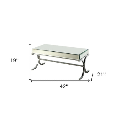 Table basse avec plateau en miroir et chrome 42" x 21" x 19"