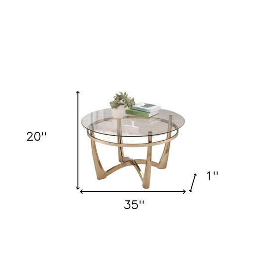 Table basse ronde en verre transparent et champagne et métal de 35 po