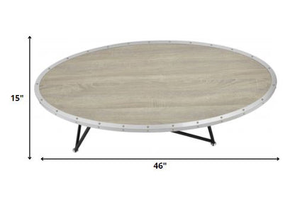 Table basse ronde en fer naturel et noir de 46 po