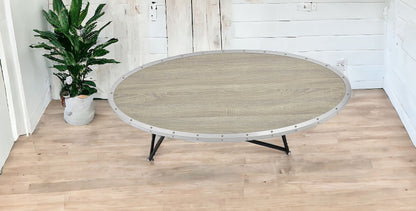 Table basse ronde en fer naturel et noir de 46 po