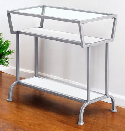 24" Clear and Silver Glass Console Table With Shelves