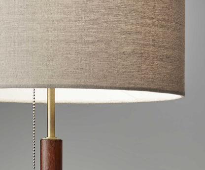 26" Antiqued Brass Solid Wood Table Lamp With Beige Drum Shade