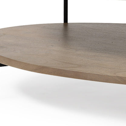 Table basse ovale avec plateau en marbre blanc et base en métal noir et étagère en bois