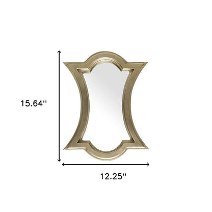 Miroir d'appoint abstrait encadré en bois doré de 16 po