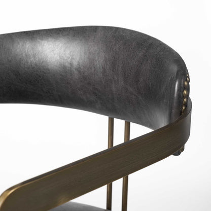 Chaise de salle à manger à dossier ouvert en cuir rembourré noir et doré