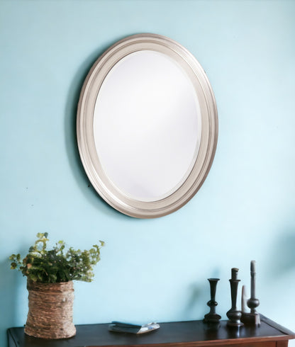 Miroir d'appoint ovale encadré argenté de 33 po