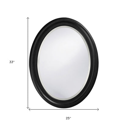 Miroir ovale avec cadre en bois noir