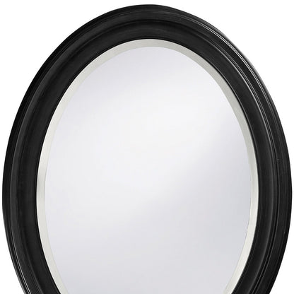 Miroir ovale avec cadre en bois noir