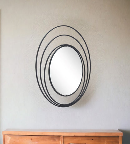 Miroir mural rond à cercles concentriques noirs de 32 po