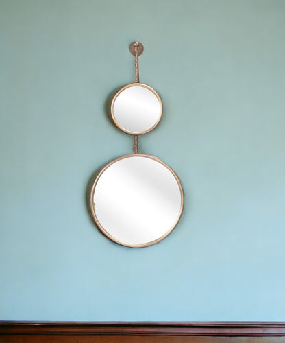 Miroir d'appoint rond encadré en acier doré de 35 po