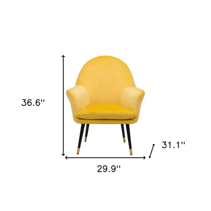 Fauteuil en velours jaune, noir et doré de 30 po