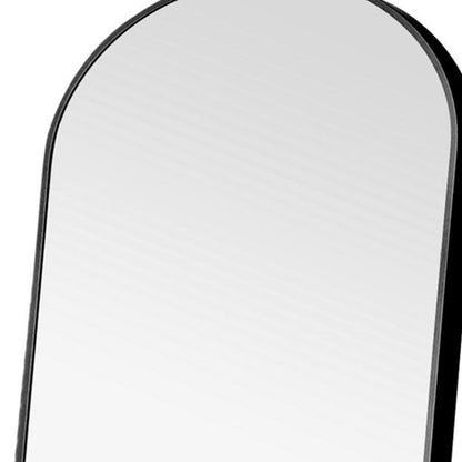 Miroir noir sur pied en arc