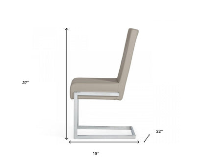 Ensemble de deux chaises de salle à manger rembourrées en similicuir gris et argent