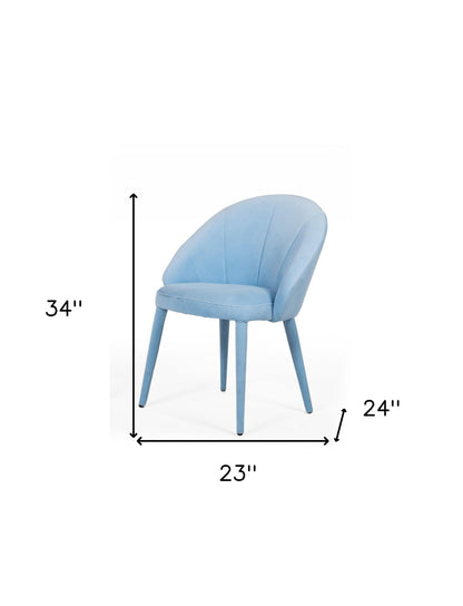 Chaise de salle à manger recouverte de tissu bleu