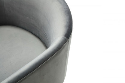 Chaise de salle à manger rembourrée en velours gris et laiton