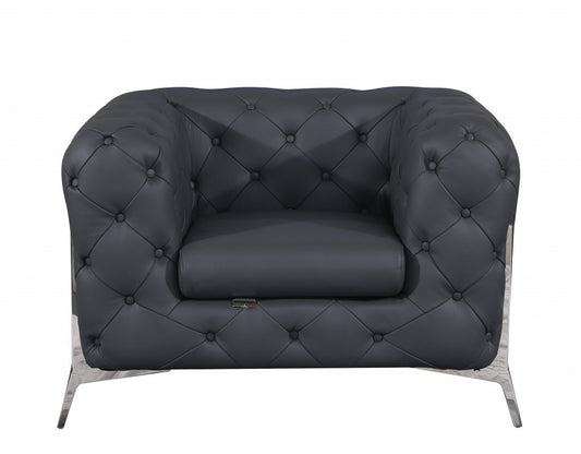 Fauteuil capitonné en cuir gris et chrome glamour