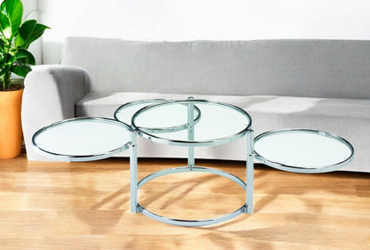 60" Clear And Silver Glass And Steel Round Nested Coffee Tables With Three Shelves