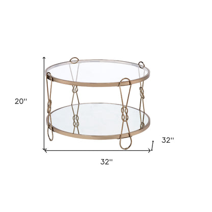 Table basse ronde en miroir champagne et argent de 32 po avec étagère