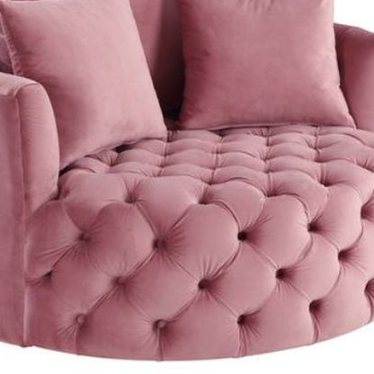 Chaise pivotante capitonnée en velours rose de 43 po et coussins décoratifs