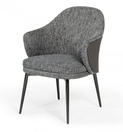 Chaise de salle à manger à dossier à oreilles en tissu rembourré gris et noir et similicuir