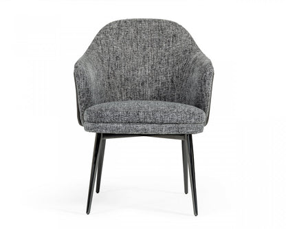 Chaise de salle à manger à dossier à oreilles en tissu rembourré gris et noir et similicuir