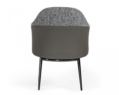 Chaise de salle à manger à dossier à oreilles en tissu rembourré gris et noir et similicuir