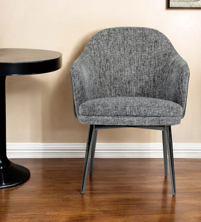 Chaise de salle à manger à dossier à oreilles en tissu rembourré gris et noir et similicuir