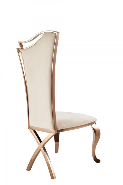 Ensemble de deux chaises de salle à manger capitonnées en velours beige et or rose