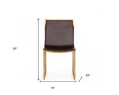 Ensemble de deux chaises de salle à manger en similicuir rembourrées marron et laiton