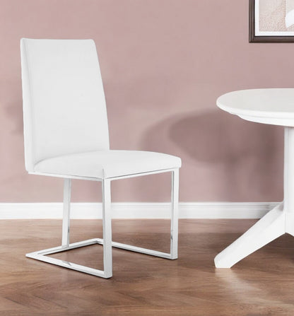 Chaise de salle à manger rembourrée en similicuir blanc et argent