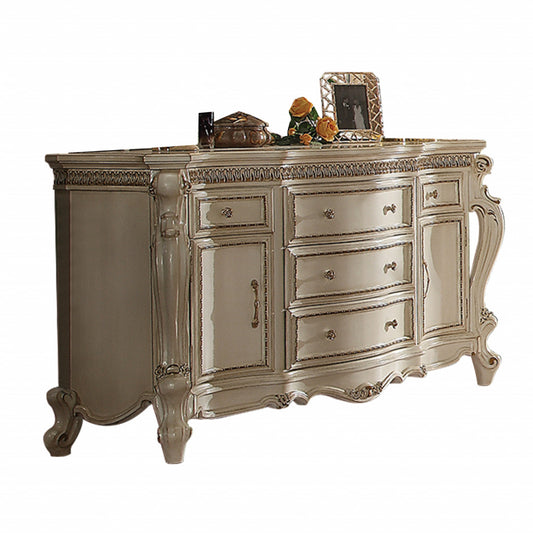 Commode triple à cinq tiroirs en bois massif et manufacturé de 69 po de couleur perle