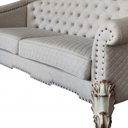 89" Ivory Velvet Sofa And Toss Pillows With Pearl Legs