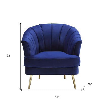 Chaise tonneau en velours bleu et rayures dorées de 31 po