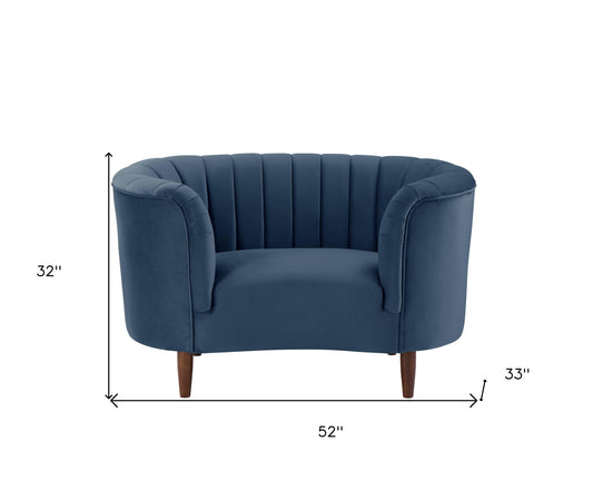 Fauteuil à accoudoirs rayé noir et velours bleu de 52 po