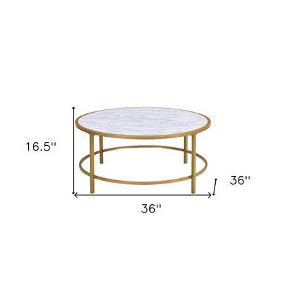 Table basse ronde en faux marbre et métal blanc et doré de 36 po