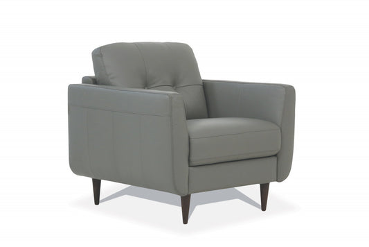 Fauteuil capitonné noir et cuir véritable vert pesto de 35 po