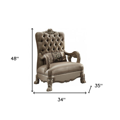 Fauteuil capitonné en velours doré et os de 34 po