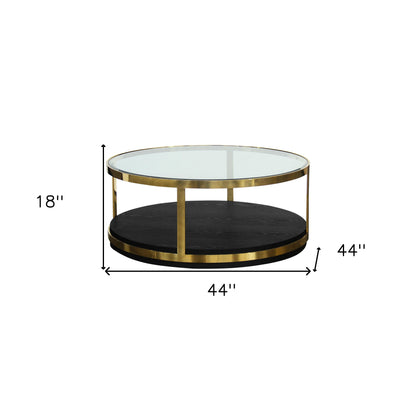 Table basse ronde en verre et métal noir et doré de 44 po avec étagère