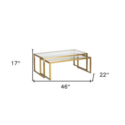 Ensemble de deux tables basses gigognes en verre doré et en acier de 46 po