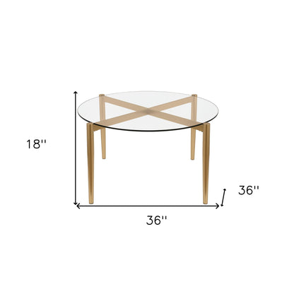 Table basse ronde en verre et acier transparent et doré de 36 po