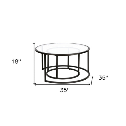 Ensemble de deux tables basses rondes gigognes en verre noir et en acier de 35 po