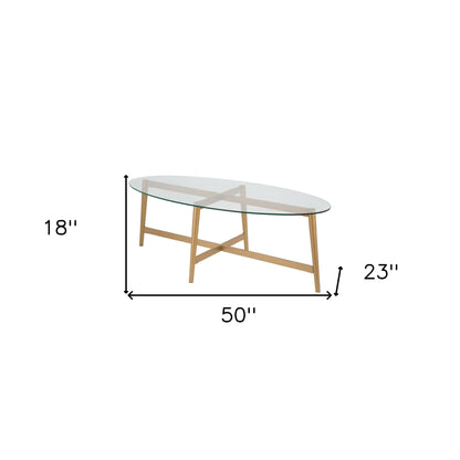 Table basse ovale en verre transparent et acier doré de 50 po