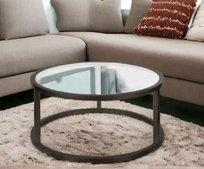 Table basse ronde en verre noir et acier de 35 po