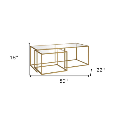 Ensemble de deux tables basses gigognes en verre doré et en acier de 50 po