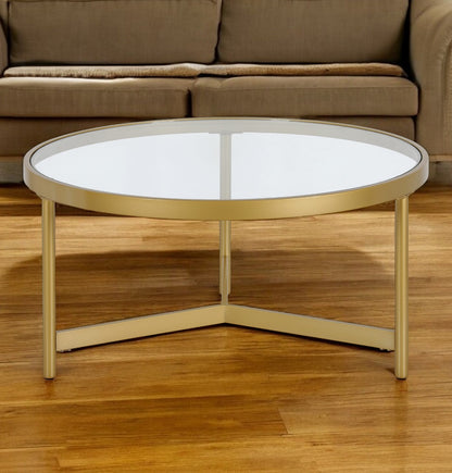 Table basse ronde en verre doré et acier de 32 po