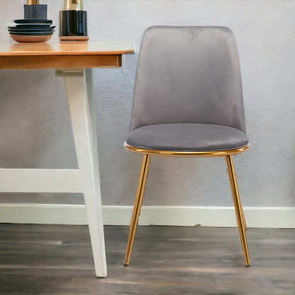 Chaise de salle à manger en velours et métal gris et doré